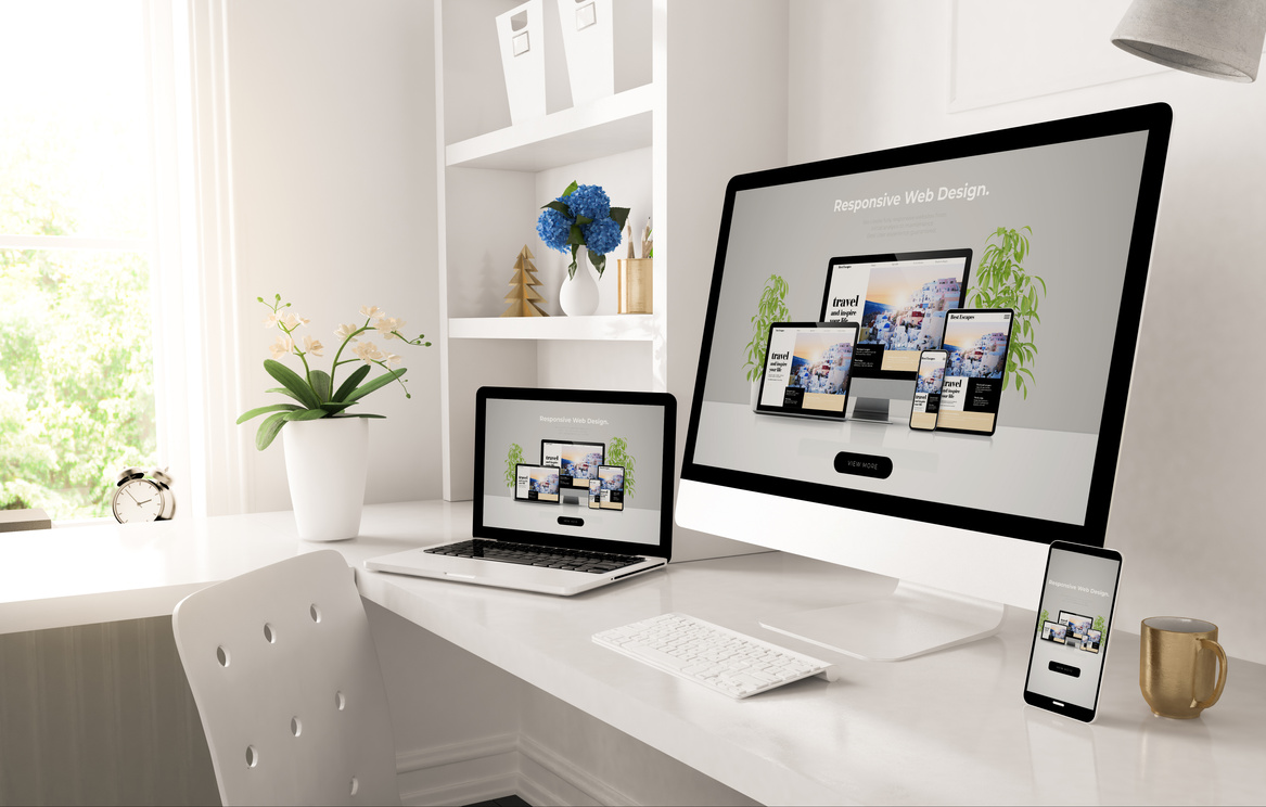 Responsive Devices on Home Desktop Showing Web Design Website